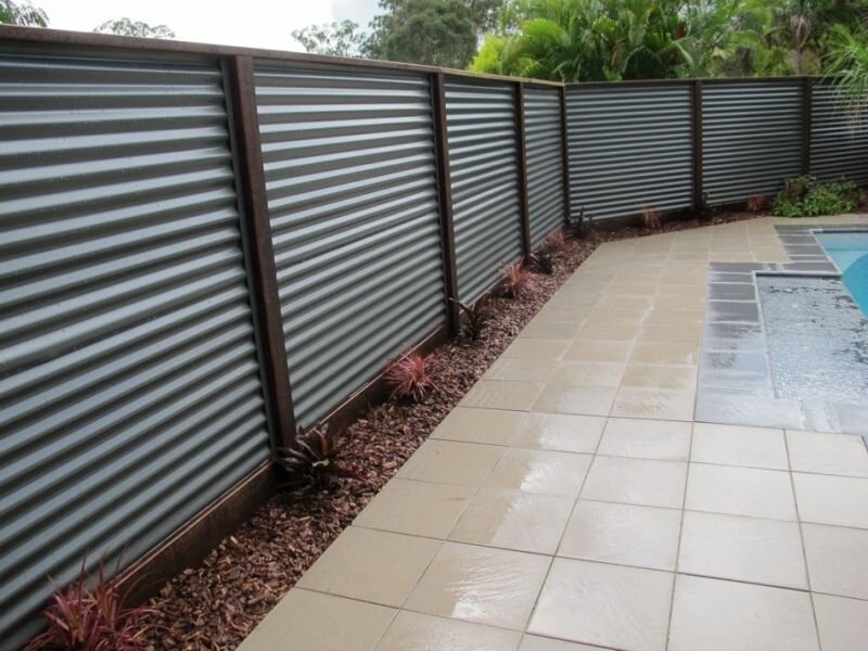 Backyard with a wooden fence and gate