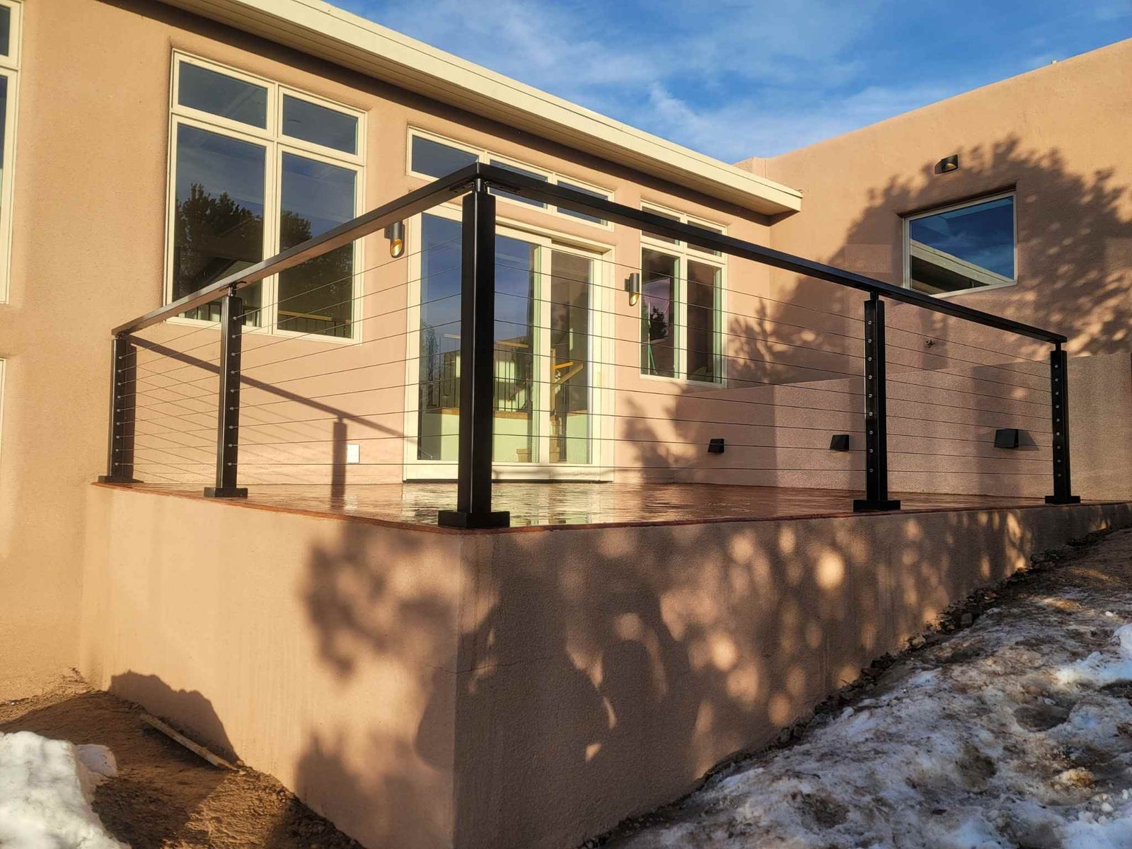 House featuring a custom-built deck