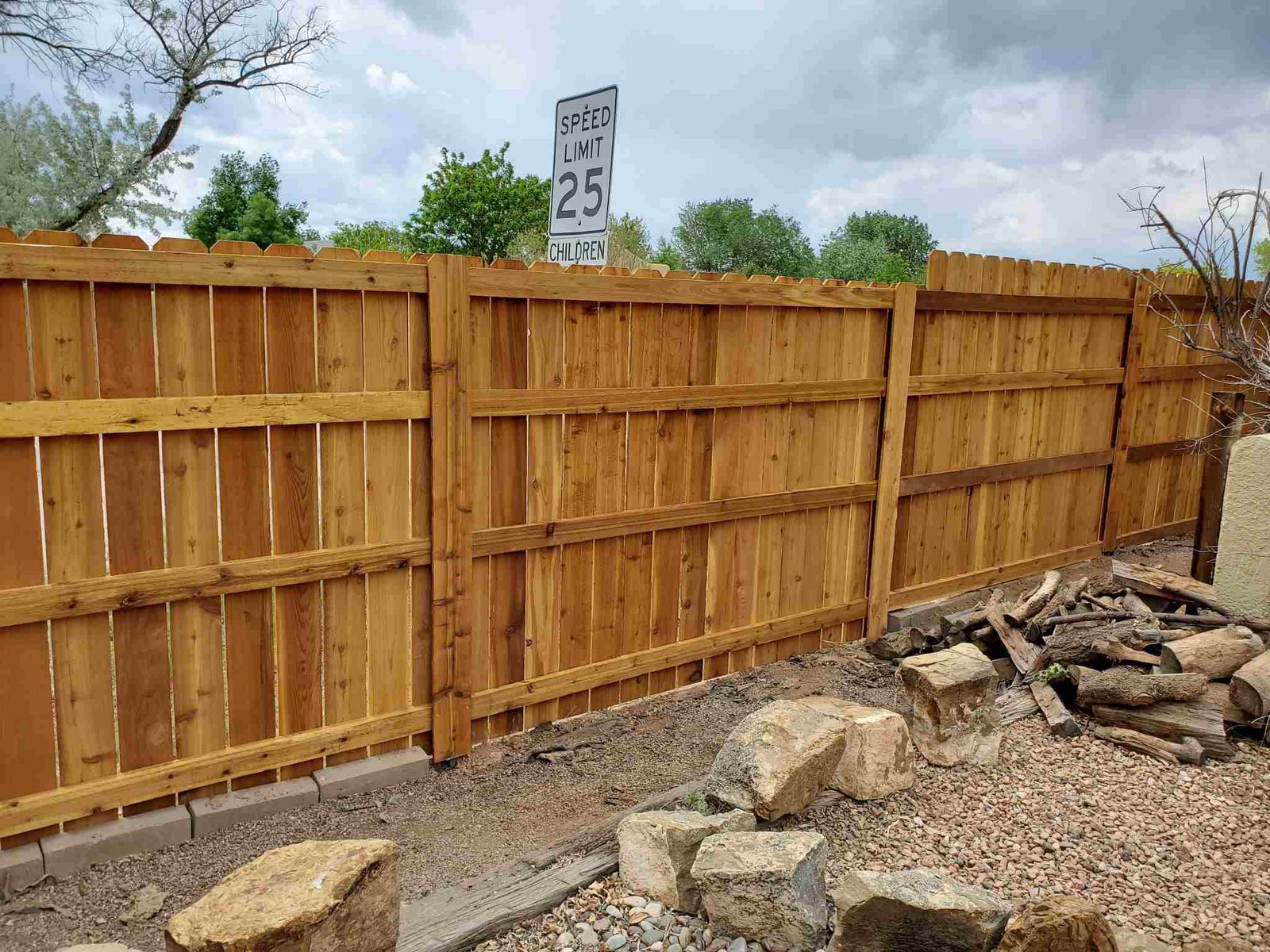 Wooden fence installed along the roadside
